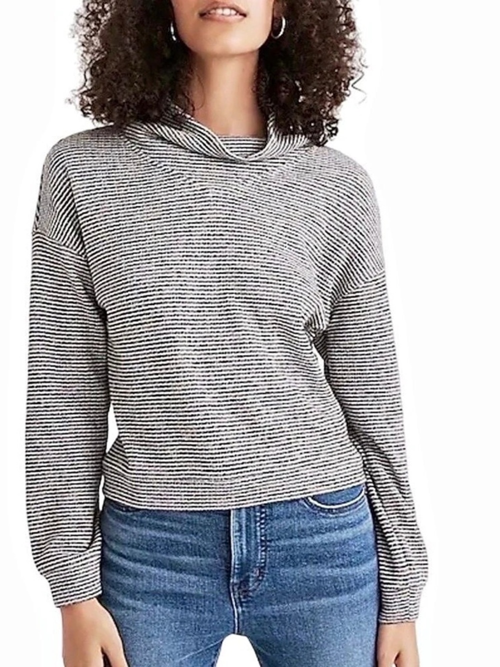 Textured turtleneck top
In rainbow stripe